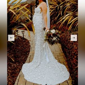 Champery couture heavily beaded wedding gown